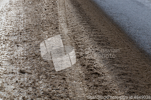 Image of Dirty snow on the road