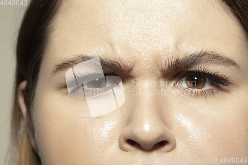 Image of Close up of face of beautiful caucasian young woman, focus on eyes