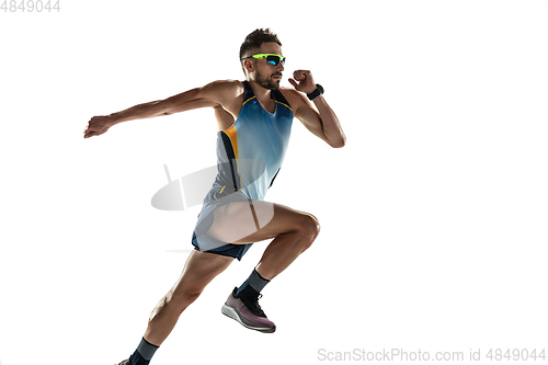 Image of Triathlon male athlete running isolated on white studio background