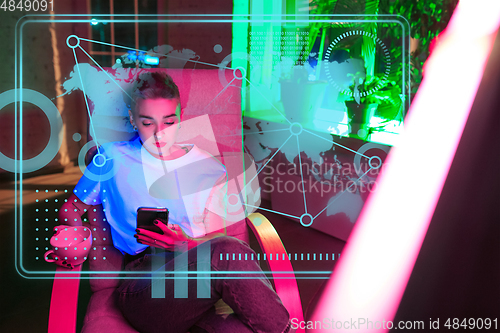 Image of Woman using interface modern technology and digital layer effect as business, finance, economics strategy concept