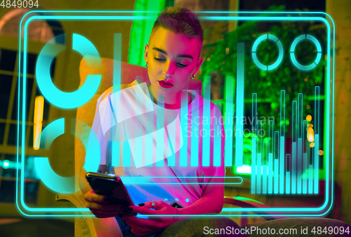 Image of Woman using interface modern technology and digital layer effect as business, finance, economics strategy concept