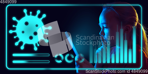 Image of Girl using interface modern technology and digital layer effect as information of coronavirus pandemic spread