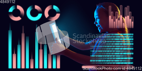 Image of Girl using interface modern technology and digital layer effect as business, finance, economics strategy concept