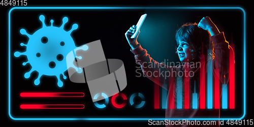 Image of Boy using interface modern technology and digital layer effect as information of coronavirus pandemic spread