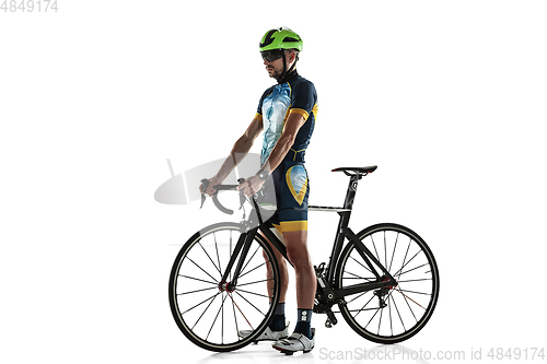 Image of Triathlon male athlete cycle training isolated on white studio background