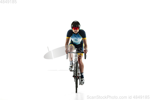 Image of Triathlon male athlete cycle training isolated on white studio background