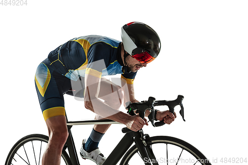 Image of Triathlon male athlete cycle training isolated on white studio background