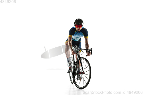 Image of Triathlon male athlete cycle training isolated on white studio background