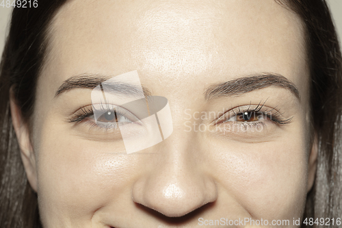 Image of Close up of face of beautiful caucasian young woman, focus on eyes