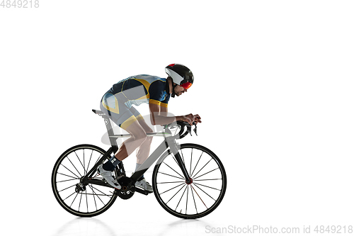 Image of Triathlon male athlete cycle training isolated on white studio background