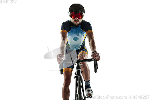 Image of Triathlon male athlete cycle training isolated on white studio background