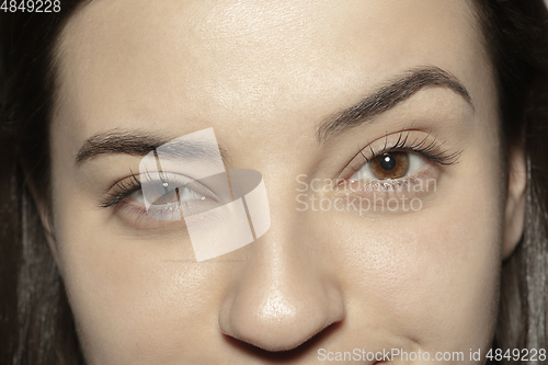 Image of Close up of face of beautiful caucasian young woman, focus on eyes