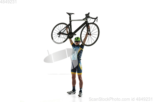 Image of Triathlon male athlete cycle training isolated on white studio background