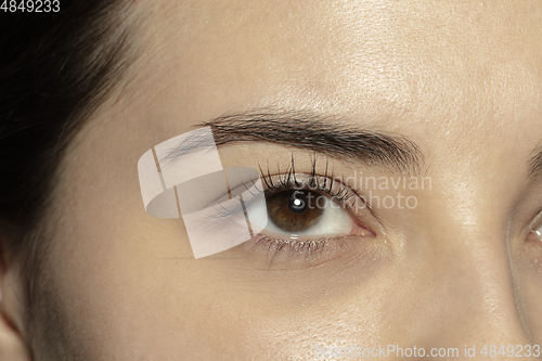 Image of Close up of face of beautiful caucasian young woman, focus on eyes