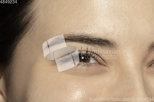 Image of Close up of face of beautiful caucasian young woman, focus on eyes