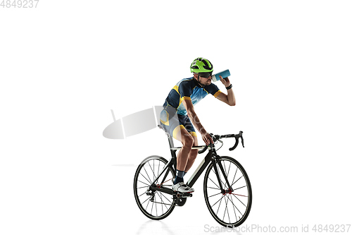 Image of Triathlon male athlete cycle training isolated on white studio background