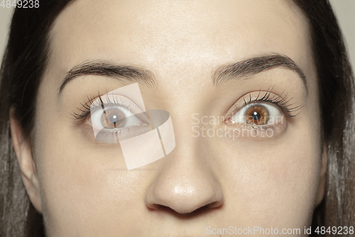 Image of Close up of face of beautiful caucasian young woman, focus on eyes