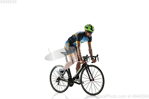 Image of Triathlon male athlete cycle training isolated on white studio background