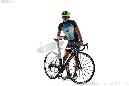 Image of Triathlon male athlete cycle training isolated on white studio background