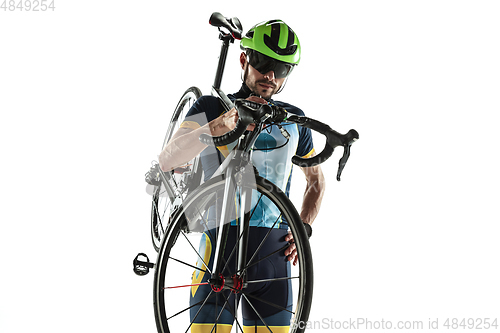 Image of Triathlon male athlete cycle training isolated on white studio background