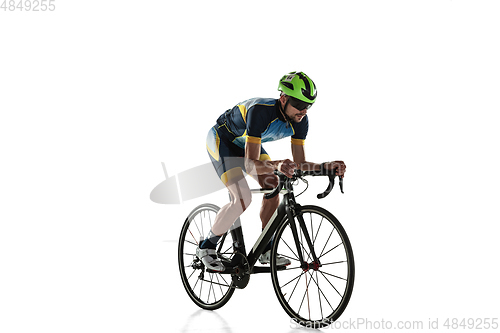 Image of Triathlon male athlete cycle training isolated on white studio background