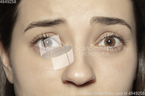 Image of Close up of face of beautiful caucasian young woman, focus on eyes