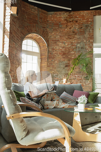 Image of Caucasian woman, freelancer during the work in home office while quarantine