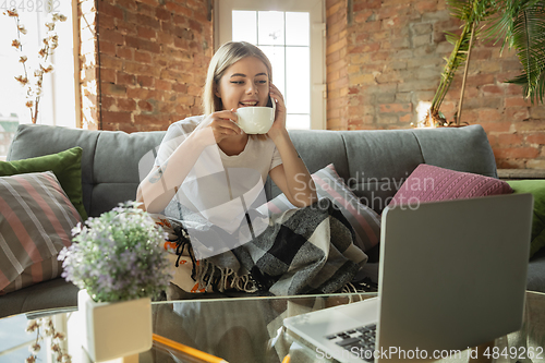Image of Caucasian woman, freelancer during the work in home office while quarantine