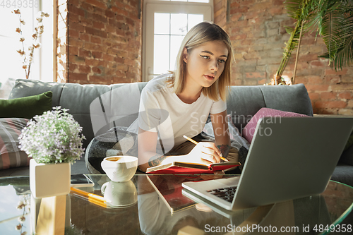 Image of Caucasian woman, freelancer during the work in home office while quarantine