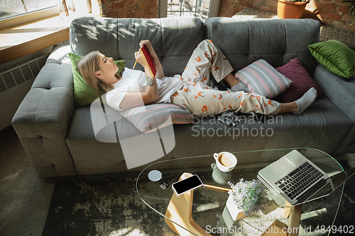 Image of Caucasian woman, freelancer during the work in home office while quarantine