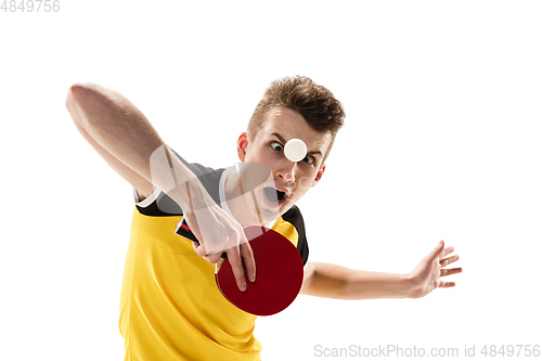 Image of Funny emotions of professional tablet tennis player isolated on white studio background, excitement in game