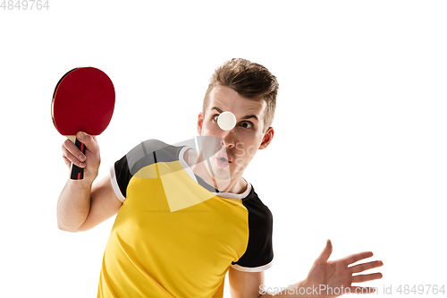 Image of Funny emotions of professional tablet tennis player isolated on white studio background, excitement in game