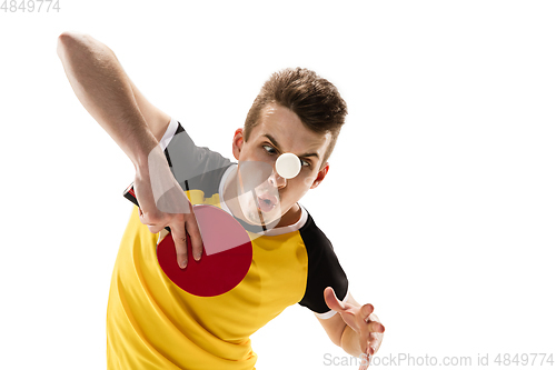 Image of Funny emotions of professional tablet tennis player isolated on white studio background, excitement in game