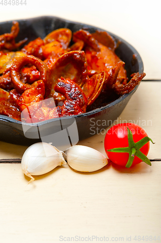 Image of fresh seafoos stew on an iron skillet