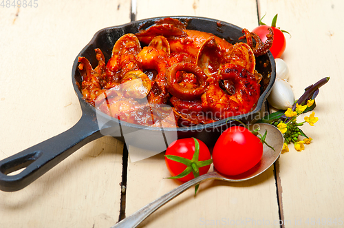 Image of fresh seafoos stew on an iron skillet