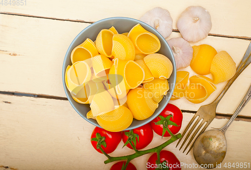 Image of Italian snail lumaconi pasta with tomatoes