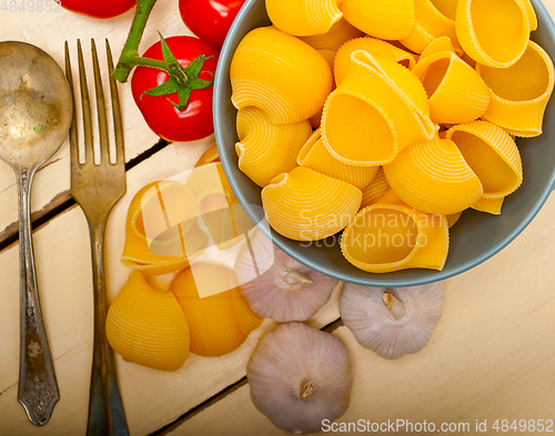 Image of Italian snail lumaconi pasta with tomatoes