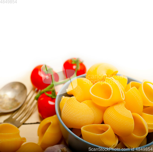 Image of Italian snail lumaconi pasta with tomatoes