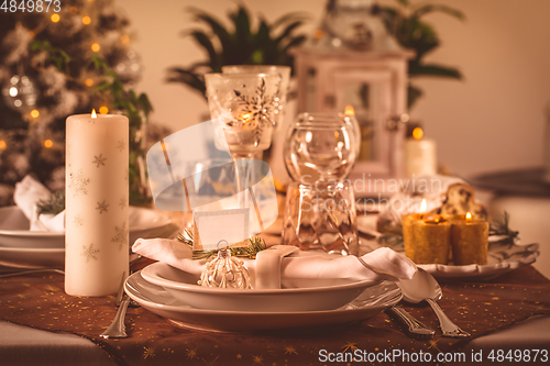 Image of Festive Christmas table in golden tone