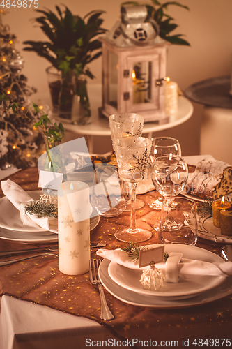 Image of Festive Christmas table in golden tone