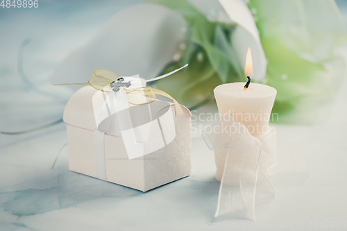 Image of First holy communion or confirmation - candle,  small present an