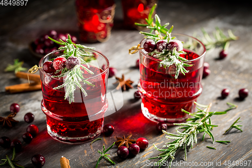 Image of Cranberry mulled wine with rosemary for Christmas