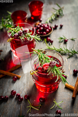 Image of Cranberry mulled wine with rosemary for Christmas