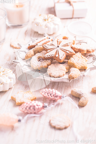 Image of Homemade Christmas gingerbread and cookies with Christmas balls and ornaments