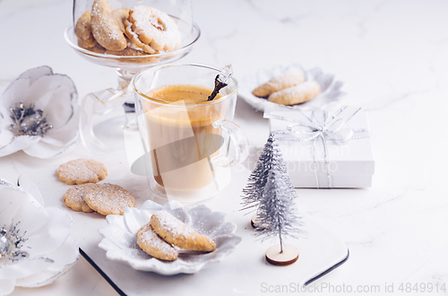 Image of Vanillekipferl - Fresh Vanilla Cookies With Powdered Sugar For Christmas with Coffee