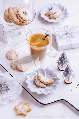 Image of Vanillekipferl - Fresh Vanilla Cookies With Powdered Sugar For Christmas with Coffee