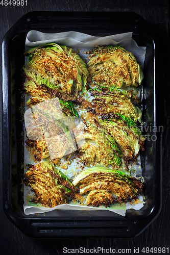 Image of Baked savoy cabbage with parmesan cheese, honey and spices