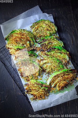 Image of Baked savoy cabbage with parmesan cheese, honey and spices