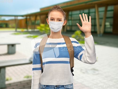 Image of teenage student girl in mask with school bag