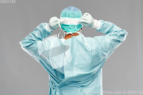 Image of indian male doctor or surgeon in protective wear